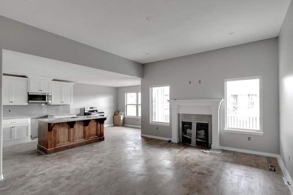 Open-concept great room repaint in soft gray — Ozark, MO