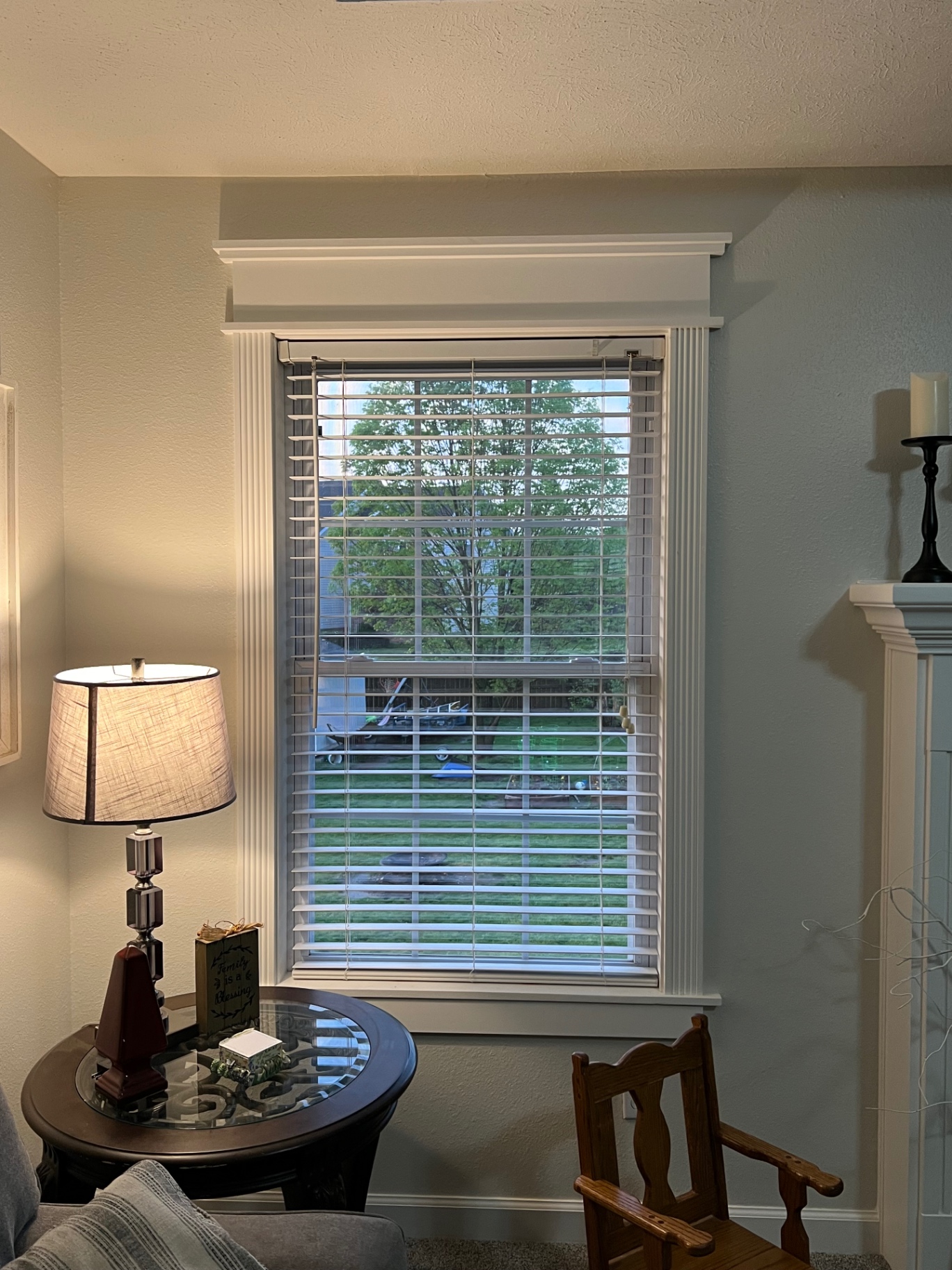 Detailed white craftsman window casing and built-up header in a Springfield area living room