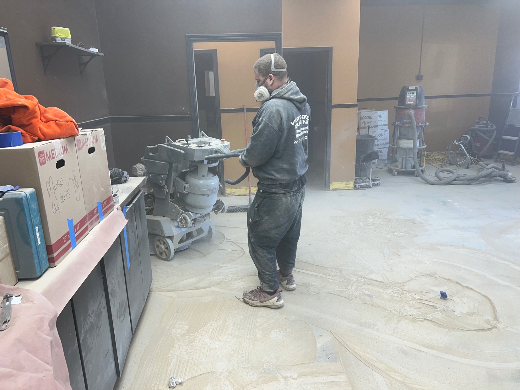 Concrete grinding and floor preparation before epoxy coating in Springfield, Missouri
