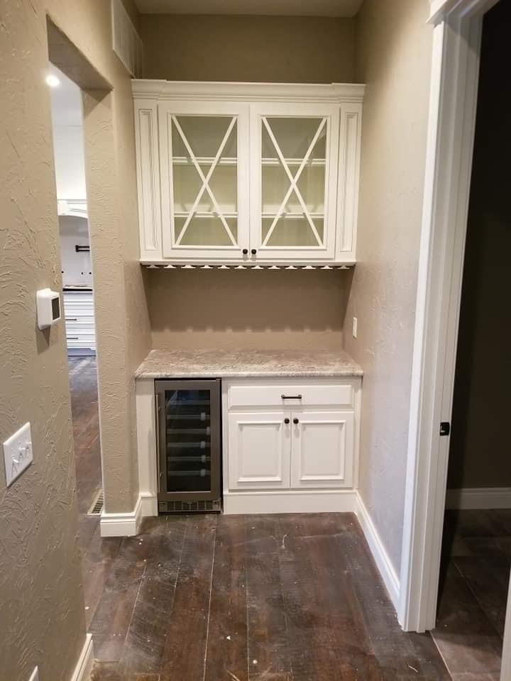 Refinished butler's pantry cabinets with glass doors in Republic, Missouri