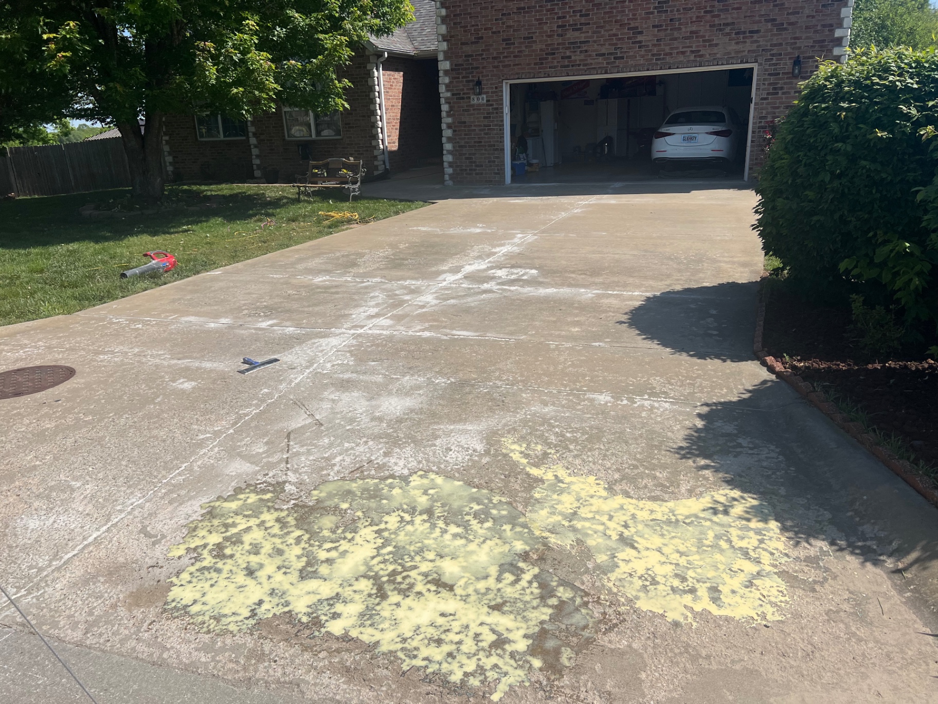 Concrete driveway prep before coating in Springfield, Missouri