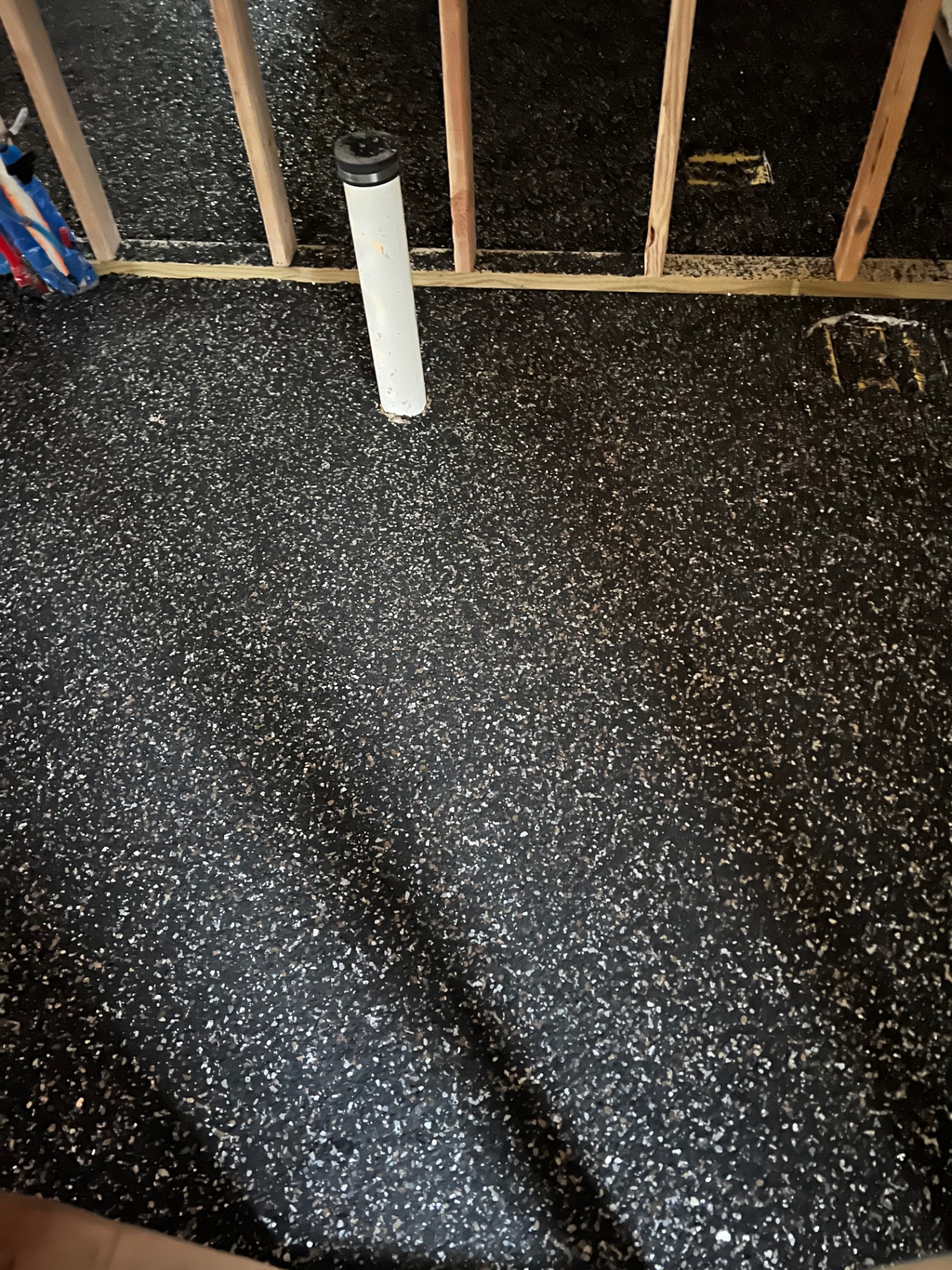 Black flake basement epoxy flooring in Nixa, Missouri