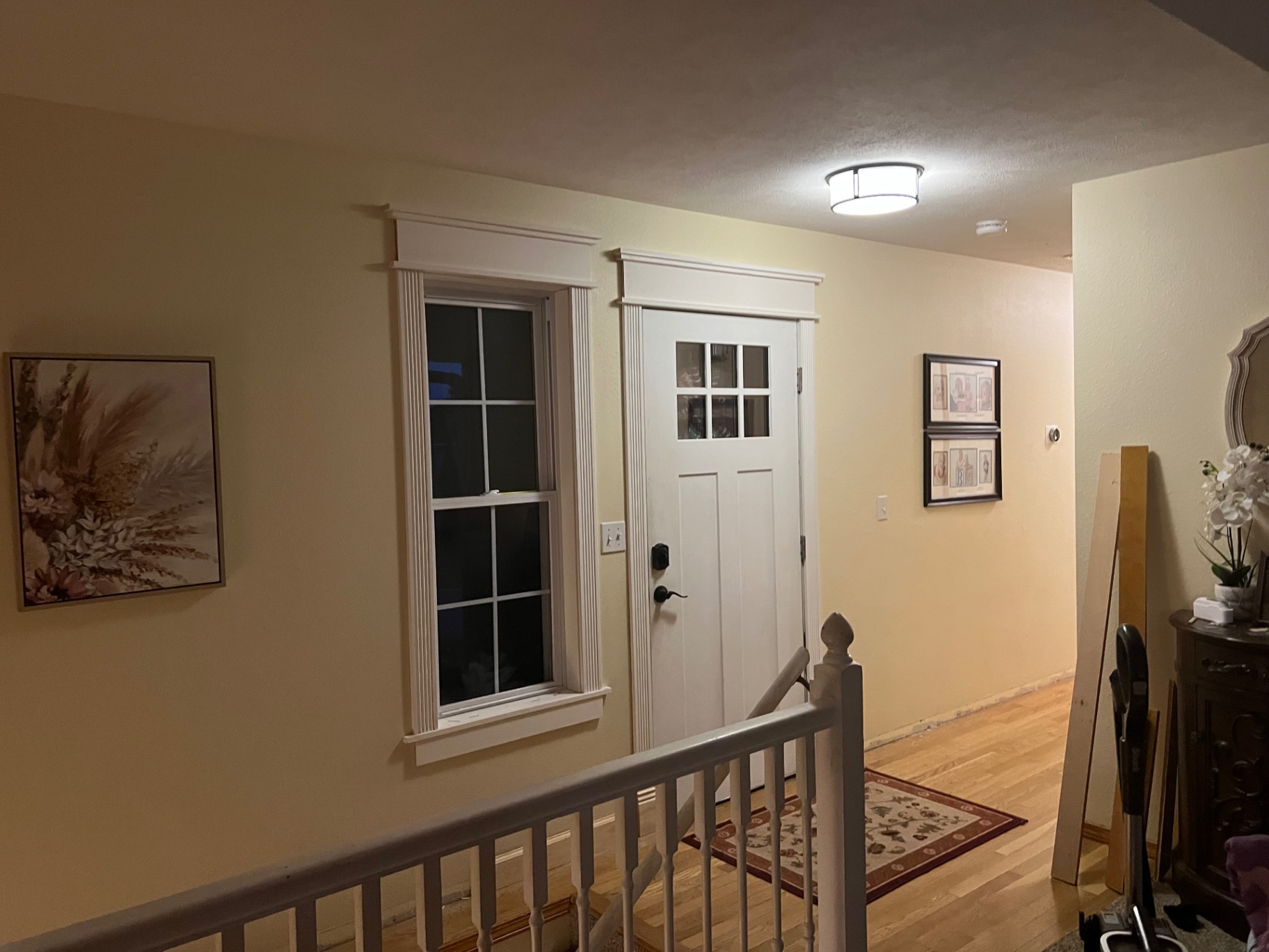 Entry door and window before craftsman trim installation in an Ozarks home