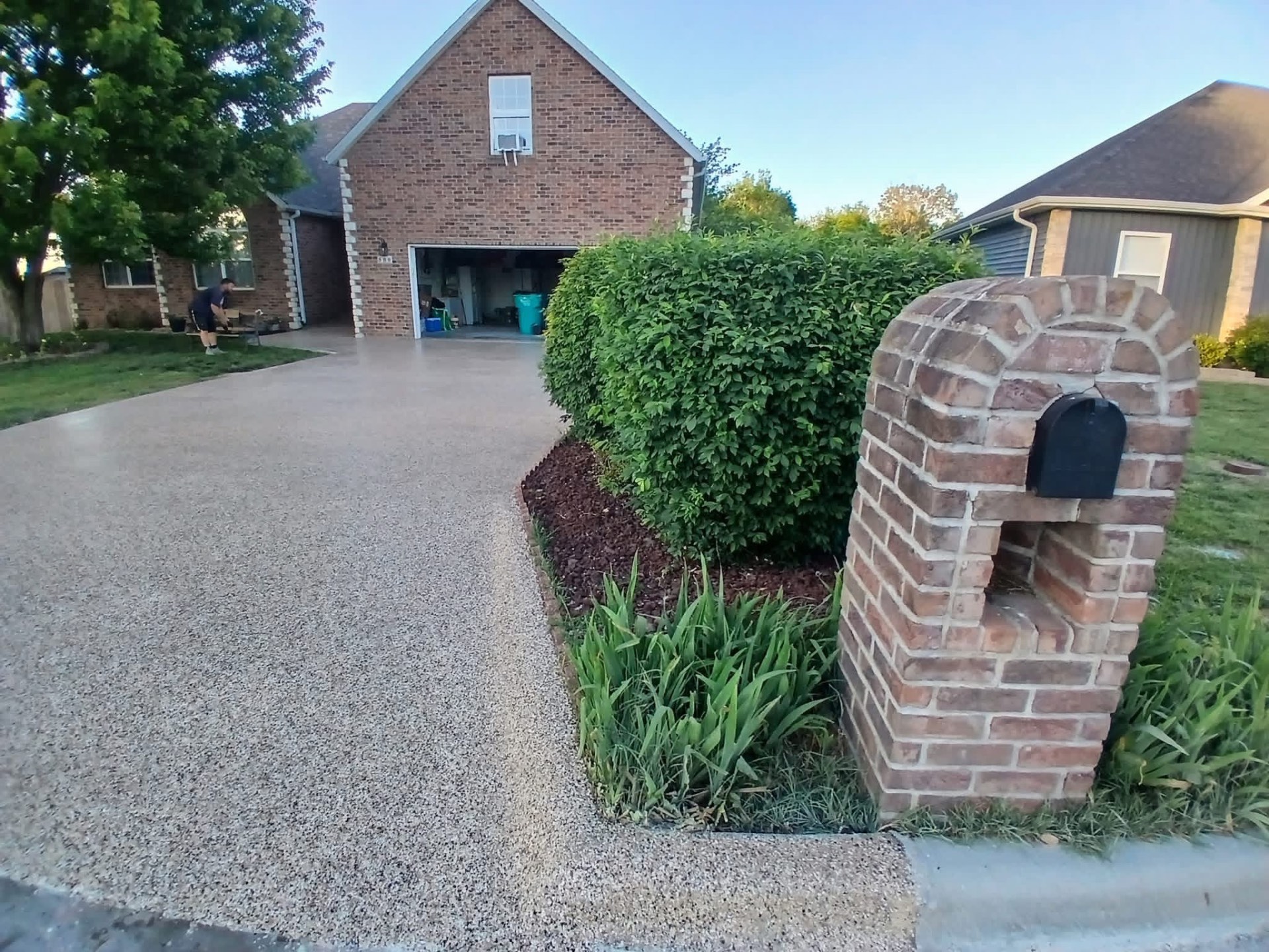 Finished epoxy flake driveway and concrete coating project in Springfield, Missouri